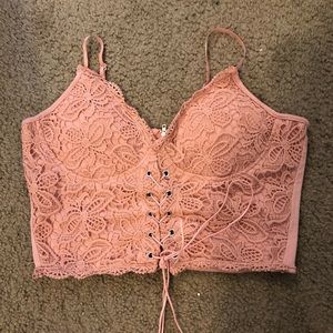 Light pink halter tank.